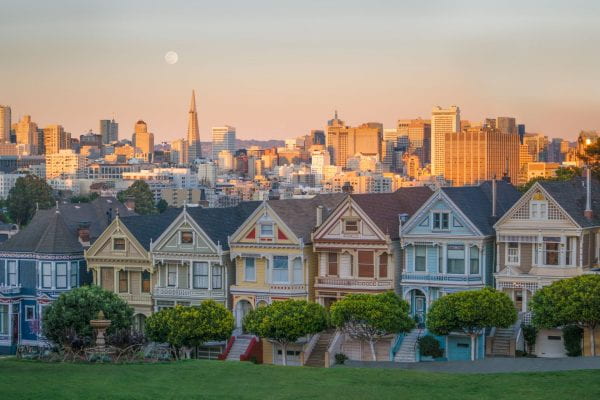 Photo of the Painted Ladies houses with downtown San Francisco in the background. Photo by Joshua Sortino on Unsplash.
